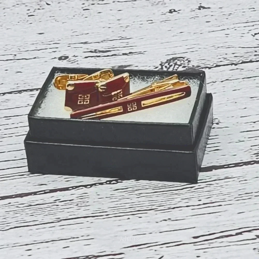 Givenchy Burgundy and Gold Tone Cufflinks and Tie Bar Set